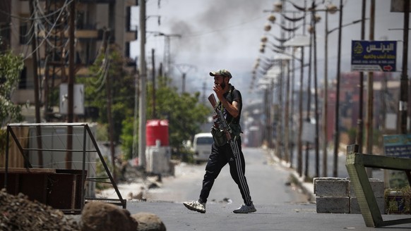 A Druze militiaman mans a checkpoint following last week&#039;s sectarian clashes in the Druze-majority town of Sweida, Syria, Friday, July 25, 2025. (AP Photo/Omar Sanadiki)
Syria Clashes