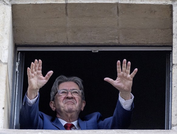 epa11465748 Jean-Luc Melenchon leader of La France Insoumise (LFI) reacts after the announcement of the results of the second round of the legislative elections in Paris, France, 07 July 2024. France  ...