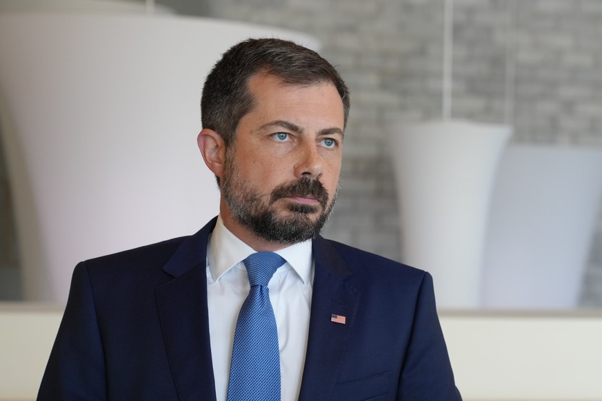 Former Transportation Secretary Pete Buttigieg listens to a reporter's question after speaking at the South Carolina Democratic Party's Spratt Issues Conference, Saturday, Aug. 22, 2026, in  ...