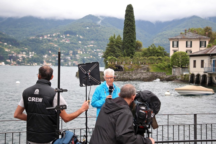epa07665568 A television crew of CNBC broadcasts from across Villa Oleandra, owned by US actor George Clooney, at Como Lake in Laglio, northern Italy, 22 June 2019. According to reports, former US pre ...