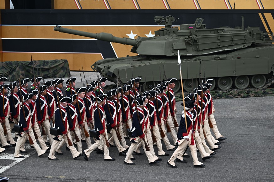 epa12176170 U.S. Army personnel and military equipment during the US Army's 250th Anniversary Parade in Washington, DC, USA, 14 June 2025. The parade, which happens to coincide with US President ...