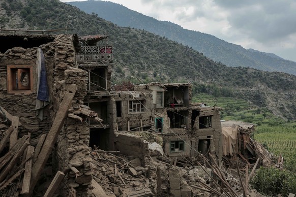 epa12349995 A view of the houses damaged in the earthquake in Kunar, Afghanistan, 03 September 2025. At least 1400 people have been killed and some 2,000 injured after a shallow magnitude-6.0 earthqua ...