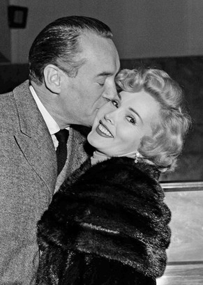 Actor George Sanders kisses his wife Zsa Zsa Gabor on her arrival at the Rome Ciampino Airport, Feb. 16, 1953. Zsa Zsa Gabor can celebrate her 90th birthday on Tuesday, Feb. 6, 2007. (AP Photo/Jim Pri ...