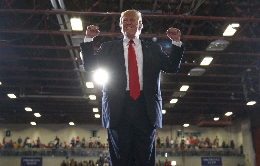 President Donald Trump reacts to the cheering crowd as he leaves a rally at the Four Seasons Arena at Montana ExpoPark, Thursday, July 5, 2018, in Great Falls, Mont., in support of Rep. Greg Gianforte ...