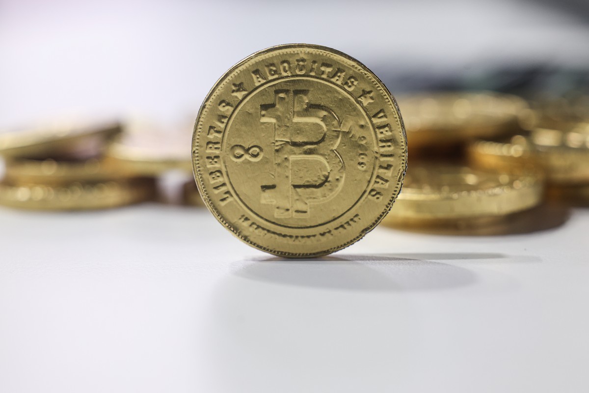 epa12891649 Bitcoin coins are seen during the Blockchain Forum 2026 in Moscow, Russia, 15 April 2026. The Blockchain Forum is the largest crypto forum and exhibition on Web3, mining, cryptocurrency, a ...