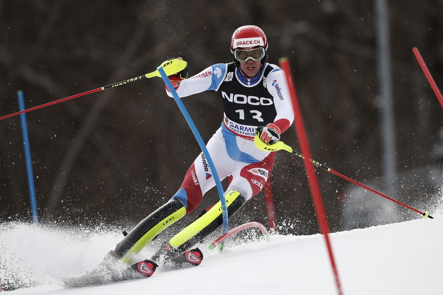 Switzerland&#039;s Ramon Zenhaeusern speeds down the course during an alpine ski, men&#039;s World Cup slalom race, in Garmisch-Partenkirchen, Germany, Saturday, Feb. 26, 2022. (AP Photo/Gabriele Facc ...