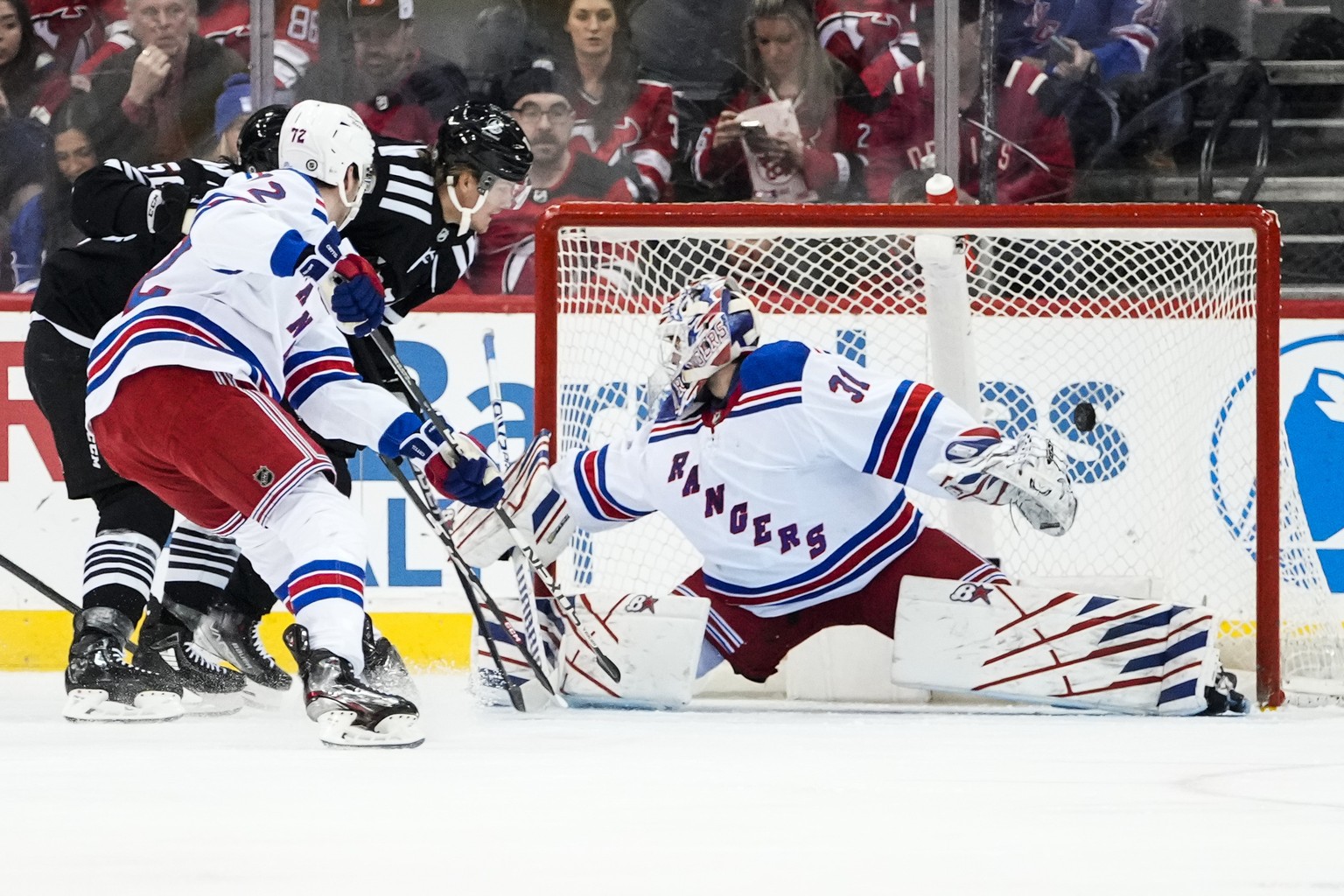 New York Rangers goaltender Igor Shesterkin (31) reacts to a puck shot past him for a goal by New Jersey Devils&#039; Erik Haula during the first period of an NHL hockey game Thursday, March 30, 2023, ...