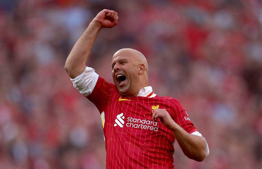 epa12059198 Liverpool manager Arne Slot celebrates in front of fans after the English Premier League soccer match between Liverpool FC and Tottenham Hotspur, in Liverpool, Britain, 27 April 2025. Live ...