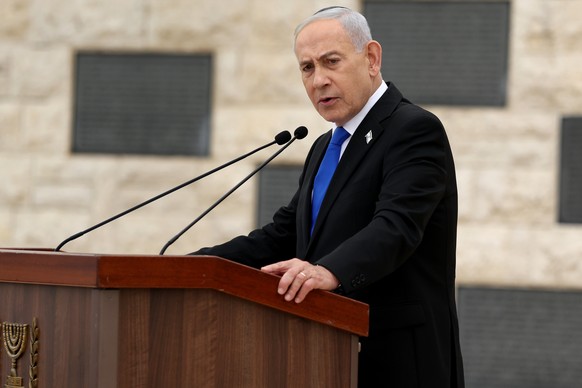 Israel's Prime Minister Benjamin Netanyahu attends a ceremony commemorating Israel's Remembrance Day for fallen soldiers, or Yom HaZikaron, at the Military Cemetery on Mount Herzl in Jerusal ...