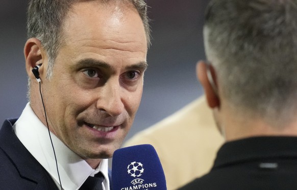 Oliver Mintzlaff, sports director of RB Leipzig speaks to a TV station ahead of the start of the Champions League Group F soccer match between RB Leipzig and Shakhtar Donetsk, in Leipzig, Germany, Tue ...