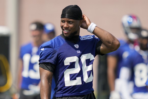 New York Giants running back Saquon Barkley participates in training drills at the NFL football team&#039;s practice facility, Wednesday, July 26, 2023, in East Rutherford, N.J. (AP Photo/John Minchil ...