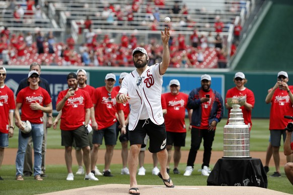 Washington Capitals&#039; Alex Ovechkin, from Russia, throws out a second ceremonial first pitch before a baseball game between the Washington Nationals and the San Francisco Giants at Nationals Park, ...