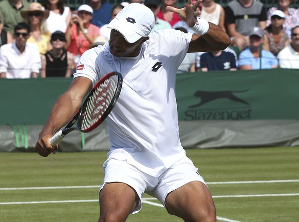 Cameron Norrie, left and Jay Clarke of Britain return a shot during the men&#039;s doubles match against Marcelo Arevalo of El Salvador and Hans Podlipnik-Castillo of Chile, on the fifth day at the Wi ...