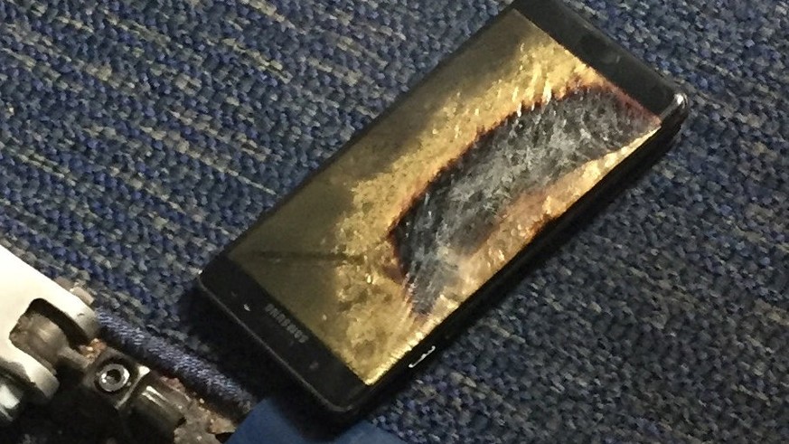 The burned Samsung Note 7 smartphone belonging to Brian Green is pictured in this undated handout photo obtained by Reuters October 6, 2016. The replacement model of the fire-prone smartphone began sm ...