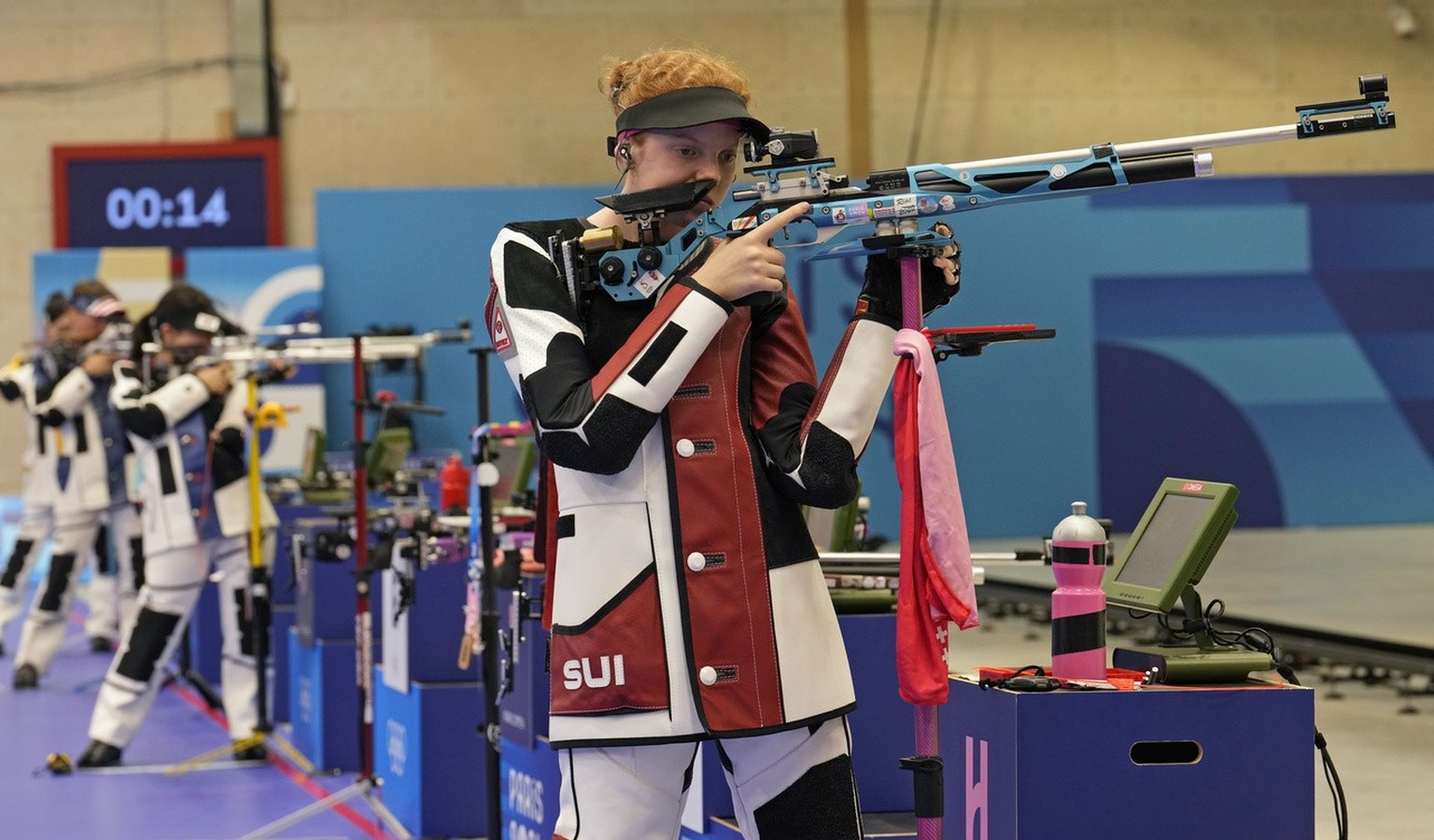 Switzerland&#039;s Audrey Gogniat reacts as she competes in the 10m air rifle women&#039;s final at the 2024 Summer Olympics, Monday, July 29, 2024, in Chateauroux, France. (AP Photo/Manish Swarup)