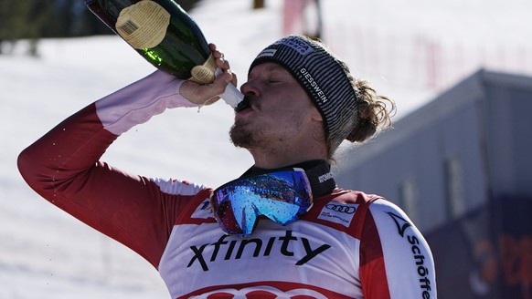 First place finisher Austria&#039;s Manuel Feller, right, and second place finisher France&#039;s Clement Noel drink champaign after a men&#039;s World Cup slalom skiing race Sunday, Feb. 25, 2024, in ...