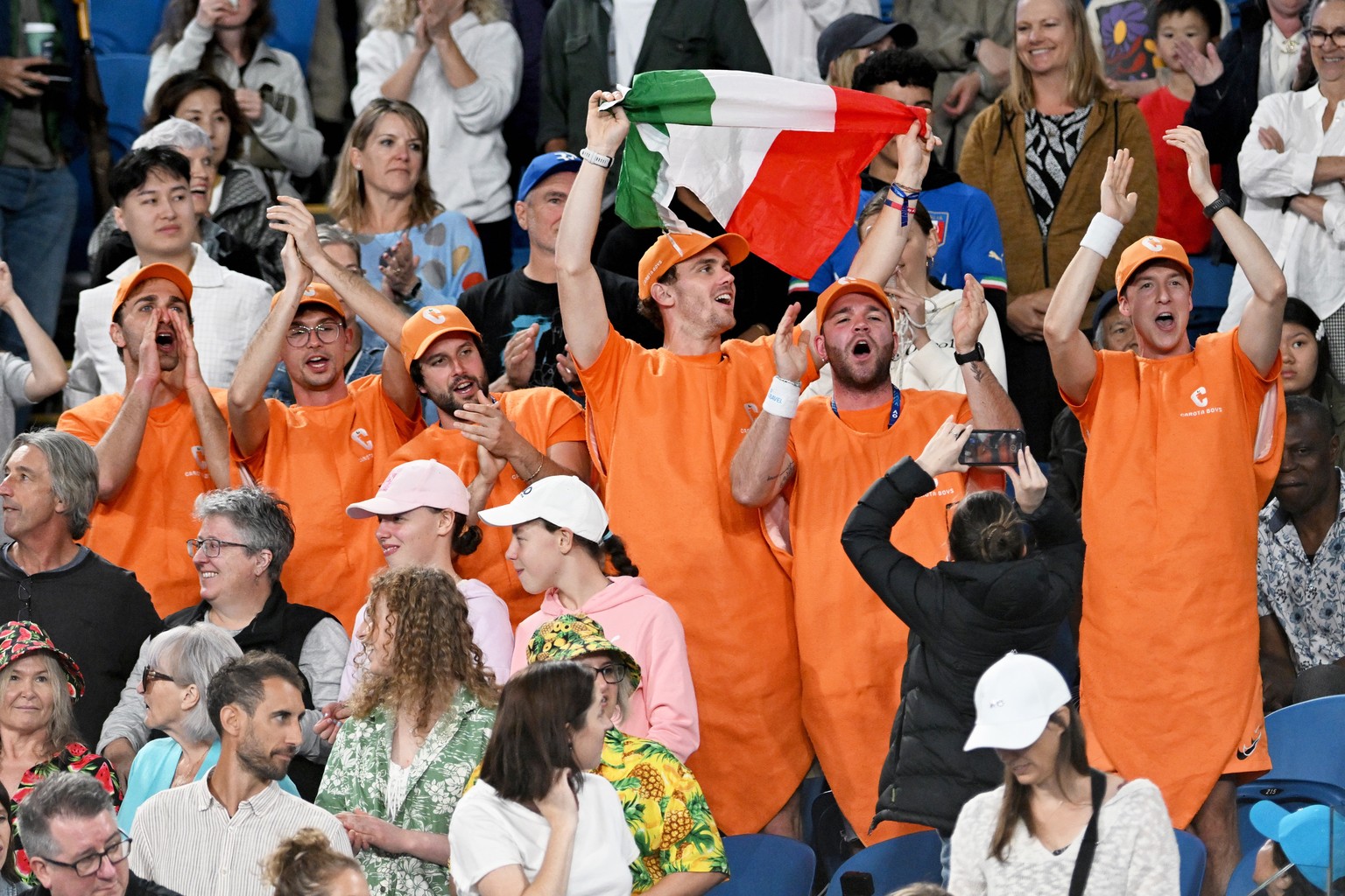 epa11084019 The Carota Boys, supporters of Jannik Sinner of Italy react during his round 2 match against Jesper de Jong of the Netherlands on Day 4 of the 2024 Australian Open at Melbourne Park in Mel ...
