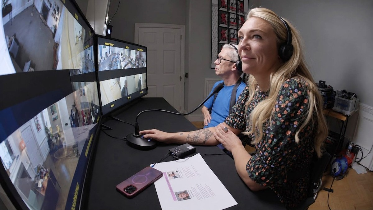 Mat Fraser and Sophie Morgan watch events unfold on monitors.