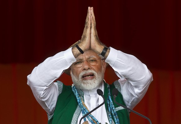 FILE- In this March 30, 2019 file photo, Indian Prime Minister Narendra Modi gestures as he speaks during an election campaign rally of his Bharatiya Janata Party (BJP) in Along, Arunachal Pradesh, In ...