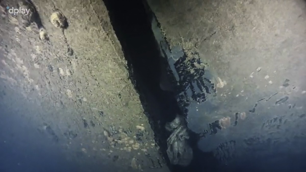 epa08703108 An undated handout grab photo from a new documentary series about the M/S Estonia disaster in 1994 made available by DPlay on 28 September 2020 shows a hole in the hull of the Estonia. The ...