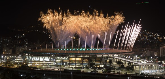 Fireworks explode above the Maracana stadium during the rehearsal of the opening ceremony of the Olympic Games in Rio de Janeiro, Brazil, Sunday, July 31, 2016. (AP Photo/Felipe Dana)