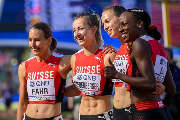 Annina Fahr, Julia Niederberger, Silke Lemmens and Yasmin Giger of Switzerland react for the women&#039;s 4x400 meters relay qualification during the IAAF World Athletics Championships, at the Hayward ...