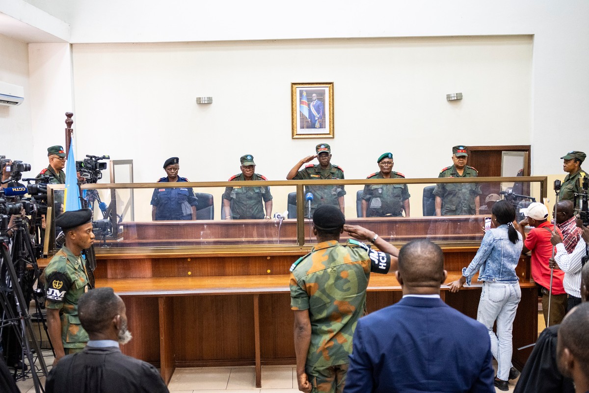 Military officers stand in the dock during the trial of former Congolese President Joseph Kabila in Kinshasa, Democratic Republic of Congo, Tuesday, Sept. 30, 2025 (AP Photo/ Samy Ntumba Shambuyi)
Con ...