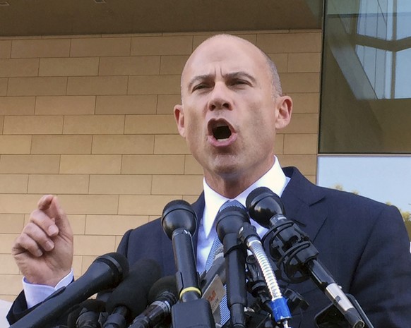 Michael Avenatti, attorney for porn actress Stormy Daniels, talks to reporters after a federal court hearing in Los Angeles, Monday, Sept. 24, 2018. Judge S. James Otero appears poised to toss out a d ...