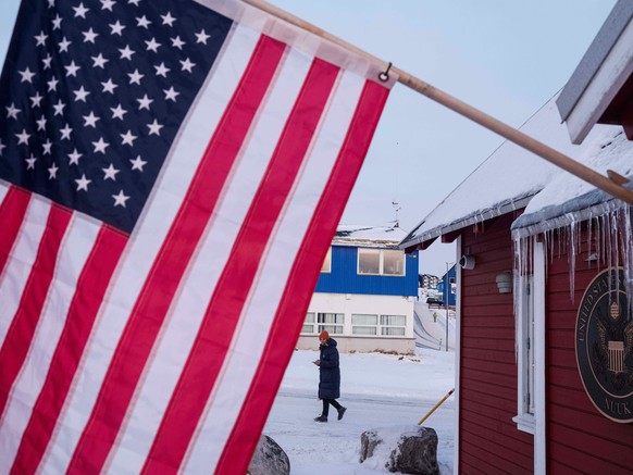 KEYPIX - An American flag is displayed on the facade of the US consulate in Nuuk, Greenland, Wednesday, Jan. 14, 2026. (AP Photo/Evgeniy Maloletka)