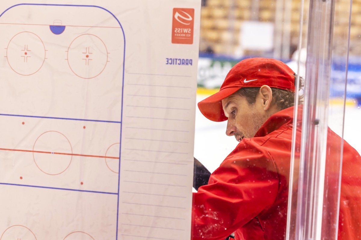 Patrick Fischer, head coach of Switzerland national ice hockey team, instructs his players, during a Switzerland team training session at the IIHF 2025 World Championship, at the Jyske Bank Boxen, in  ...