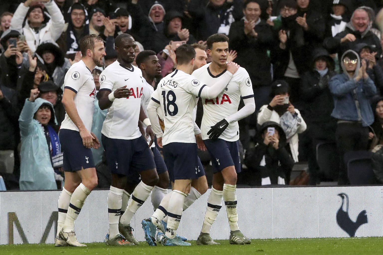 Tottenham&#039;s Dele Alli, right, celebrates after scoring his side&#039;s second goal during the English Premier League soccer match between Tottenham Hotspur and Brighton &amp; Hove Albion at the T ...