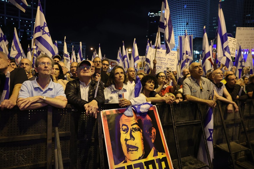 epa10641599 People march in a protest against the justice system reform in Tel Aviv, Israel, 20 May 2023. Mass protests against the government justice system reform plan continue across the country. E ...