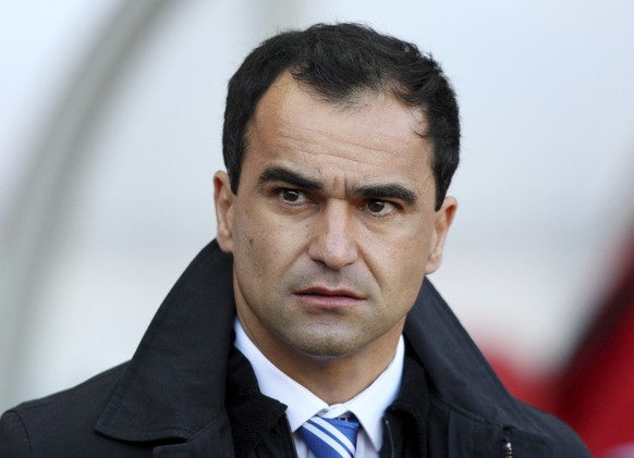 FILE - In this Saturday, Sept. 29, 2012 file photo Wigan Athletic&#039;s manager Roberto Martinez looks on ahead of their English Premier League soccer match against Sunderland at the Stadium of Light ...