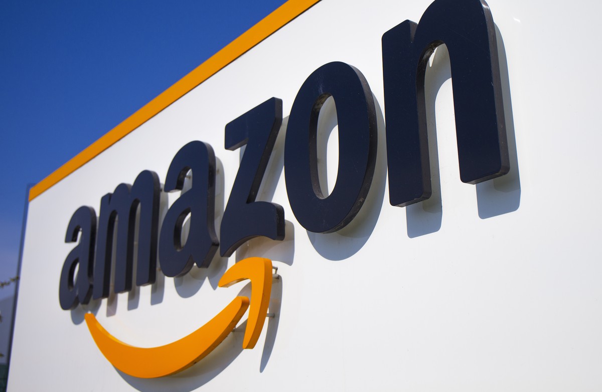 FILE - This April 16, 2020 shows the Amazon logo in Douai, northern France. Online behemoth Amazon reported a shortfall in third quarter profits and sales as the pandemic-induced online splurging ease ...