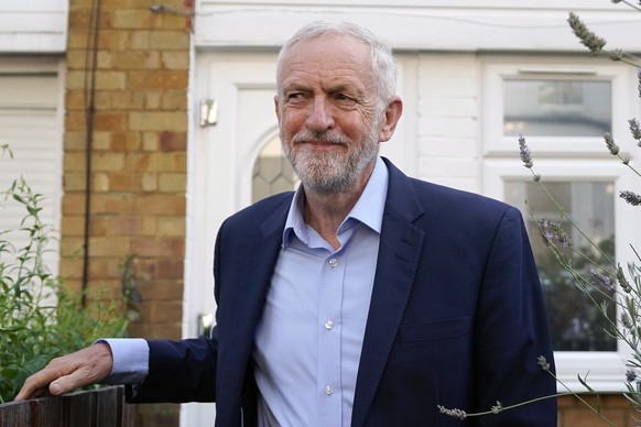 epaselect epa07796752 Leader of the British Labour Party Jeremy Corbyn leaves his home in central London, Britain, 27 August 2019. Mr Corbyn is due to host cross party talks later in the day to discus ...