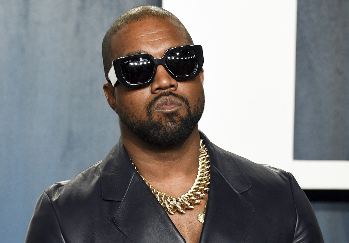 FILE - Kanye West arrives at the Vanity Fair Oscar Party on Feb. 9, 2020, in Beverly Hills, Calif. A surge of anti-Jewish vitriol, spread by a world-famous rapper