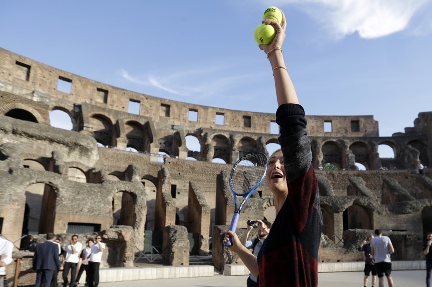 Russia&#039;s Maria Sharapova looks up during an exhibition at the Rome ancient Colosseum ahead of the Italian Open tennis tournament, Sunday, May 14, 2017. (AP Photo/Gregorio Borgia)