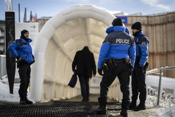 Police is on guard outside Congress Centre during the 52nd annual meeting of the World Economic Forum, WEF, in Davos, Switzerland, Sunday, January 15, 2023. The meeting brings together entrepreneurs,  ...