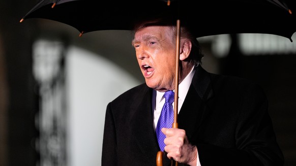 President Donald Trump speaks with reporters before departing on Marine One from the South Lawn of the White House, Friday, Jan. 9, 2026, in Washington. (AP Photo/Alex Brandon)
Donald Trump