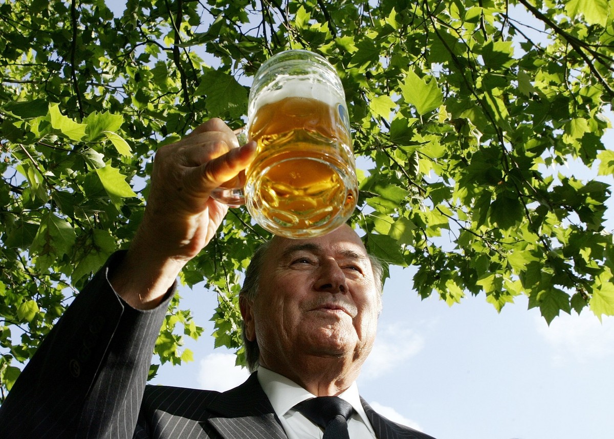 FIFA President Joseph Blatter toasts with a Bavarian beer during a greeting with Bavaria's government in Munich, southern Germany,Tuesday, June 6, 2006. The opening match of the Soccer World Cup  ...
