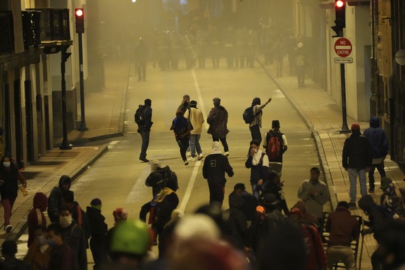 Demonstrators clash with police during protests against the economic policies of President Guillermo Lasso, near the government palace in Quito, Ecuador, Wednesday, June 15, 2022. (AP Photo/Dolores Oc ...