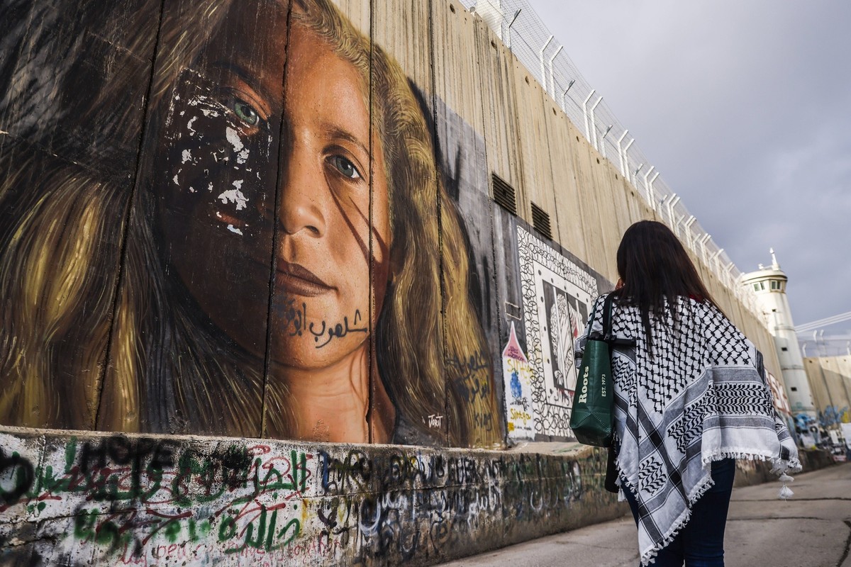 Street Art And Banksy Hotel In Bethlehem Street art graffiti with a portait of a Palestinian activist Ahed Tamimi is seen on the Israeli separation West Bank Wall in Bethlehem, Palestine on December 2 ...