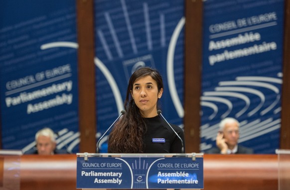 epa07071261 (FILE) - The former IS prisoner Nadia Murad delivers her speech after winning the Vaclav Havel Human Rights Prize in the Council of Europe in Strasbourg, France, 10 October 2016 (reissued  ...