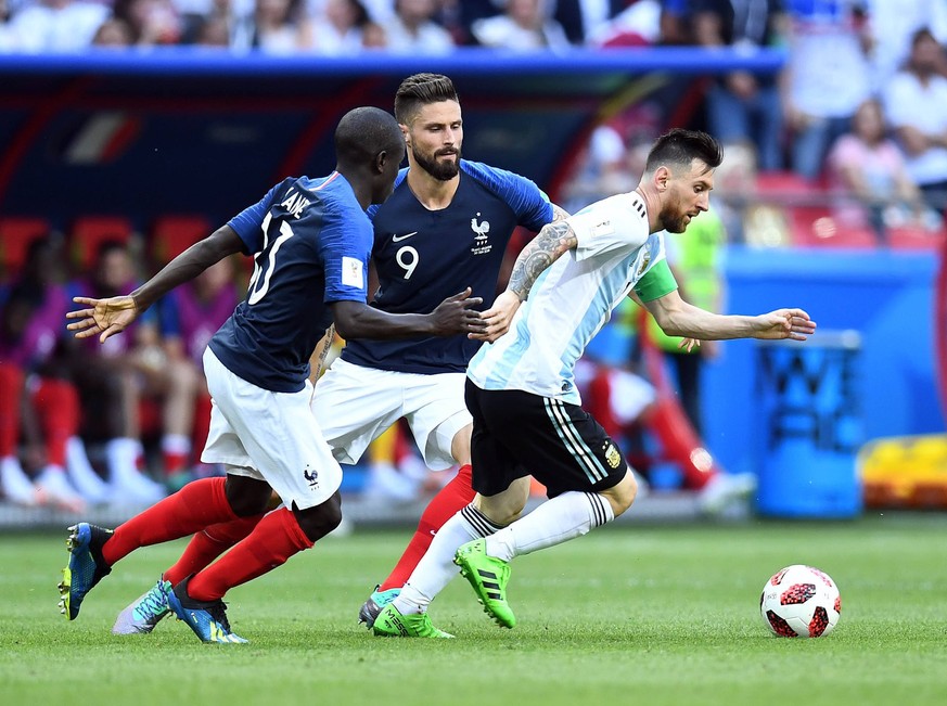 Soccer: World Cup-France vs Argentina, Jun 30, 2018 Kazan, Russia Argentina forward Lionel Messi 10 controls the ball against France midfielder Ngolo Kante 13 and forward Olivier Giroud 9 in the round ...