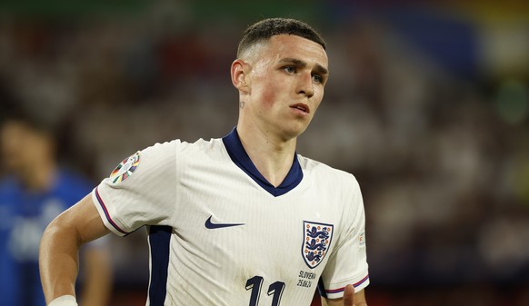 epa11437822 Phil Foden of England during the UEFA EURO 2024 group C soccer match between England and Slovenia, in Cologne, Germany, 25 June 2024. EPA/YOAN VALAT