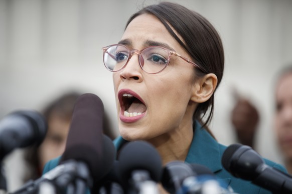 epa07350678 Democratic Representative from New York Alexandria Ocasio-Cortez delivers remarks during a press conference on deportation at Capitol Hill in Washington, DC, USA, 07 February 2019. During  ...