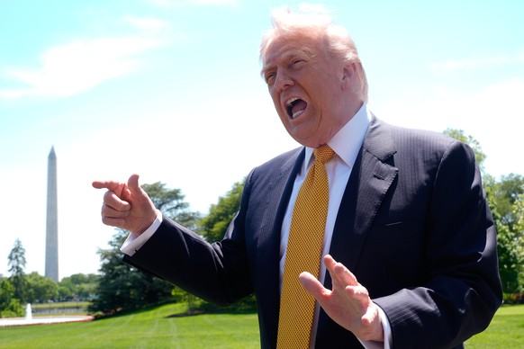 President Donald Trump speaks to reporters as he leaves the White House for travel to Beijing, Tuesday, May 12, 2026, in Washington, to meet with China's President Xi Jinping. (AP Photo/Manuel Ba ...
