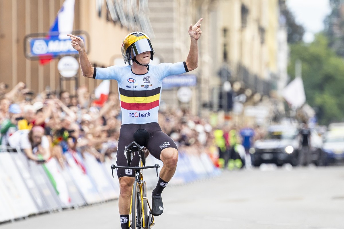 Gold medalist Remco Evenepoel of Belgium reacts after crossing the finish line in the Men's Elite Individual Time Trial race at the 2024 UCI Road and Para-cycling Road World Championships in Zuri ...
