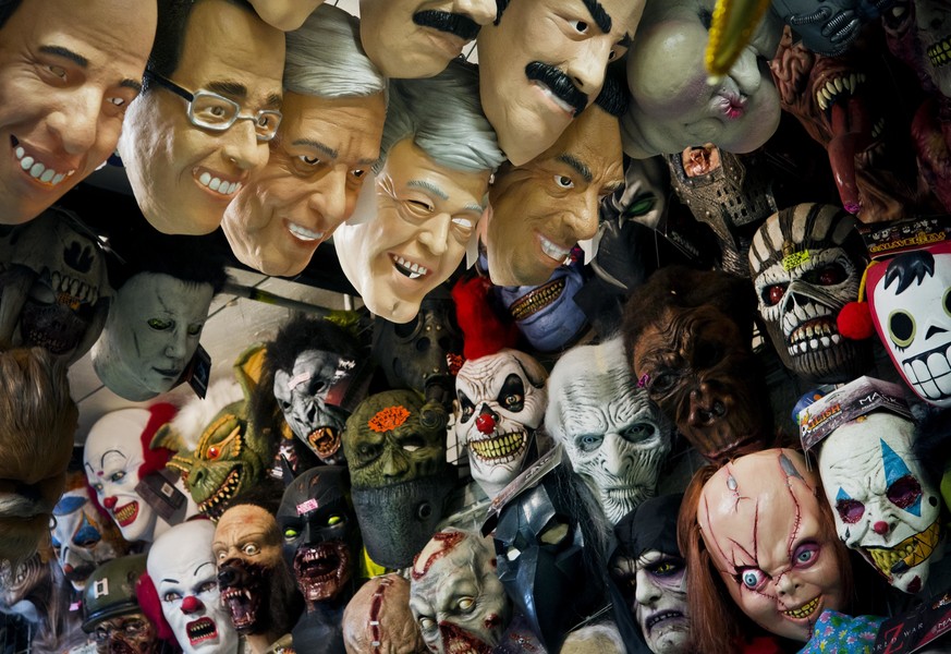 From left to right: masks representing Mexican presidential candidates Jose Antonio Meade, of the Institutional Revolutionary Party (PRI), Ricardo Anaya, center, of the left-right coalition Forward fo ...