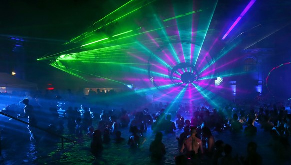 Revellers attend the Cinetrip Future Disco bath party at Szechenyi Bath in Budapest in the early hours of August 10, 2014. REUTERS/Laszlo Balogh (HUNGARY - Tags: SOCIETY)